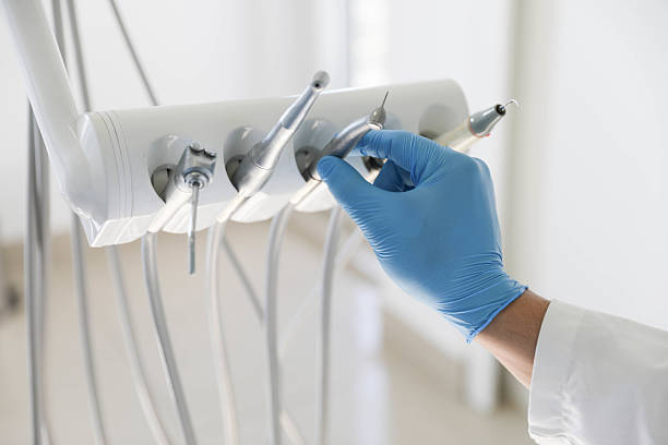 Professional Tooth Extraction technician working in Polk County County, NC